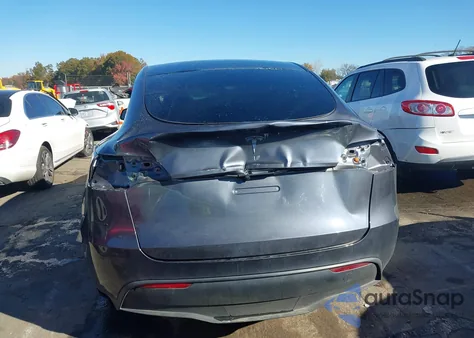 2023 Tesla Model Y Rwd from USA, damaged, VIN 7SAYGDED8PF943012